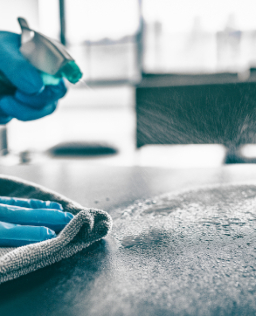 Cleaning,Home,Table,Sanitizing,Kitchen,Table,Surface,With,Disinfectant,Spray